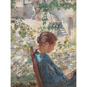 Young Woman reading in Garden